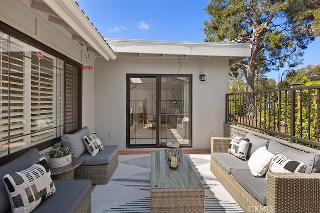 view of patio / terrace with an outdoor hangout area and fence