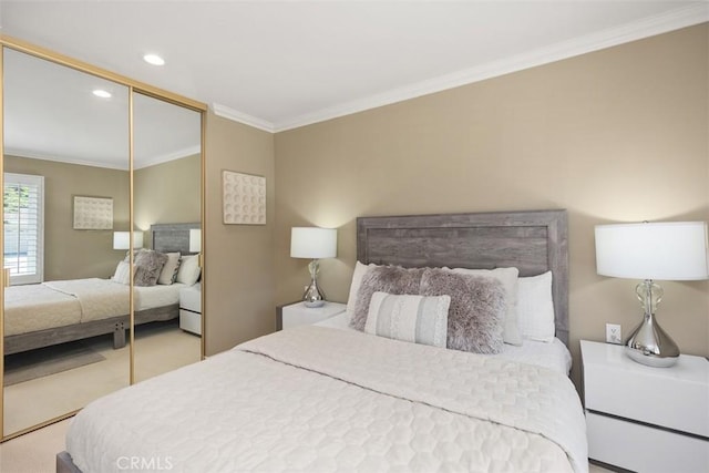 carpeted bedroom with ornamental molding, a closet, and recessed lighting