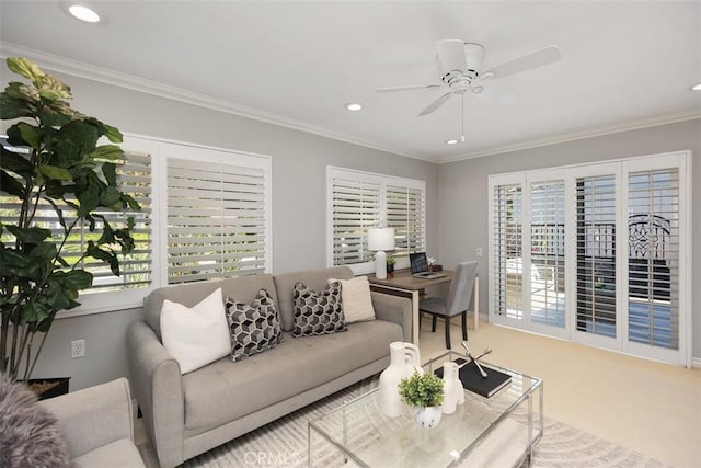 living room with ornamental molding, carpet flooring, baseboards, recessed lighting, and a ceiling fan