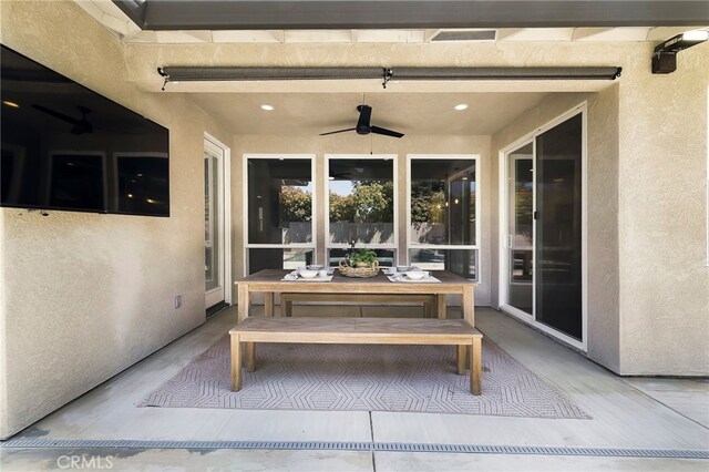 view of patio with ceiling fan