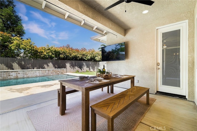 2617 Sedona Ave, Chico, CA 95973 - view of patio featuring outdoor dining area, a ceiling fan, and a fenced backyard