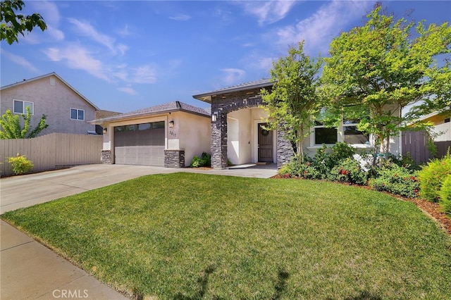 2617 Sedona Ave, Chico, CA 95973 - view of front facade with stone siding, stucco siding, driveway, and a garage