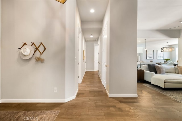 2617 Sedona Ave, Chico, CA 95973 - hallway with wood finished floors, baseboards, and recessed lighting