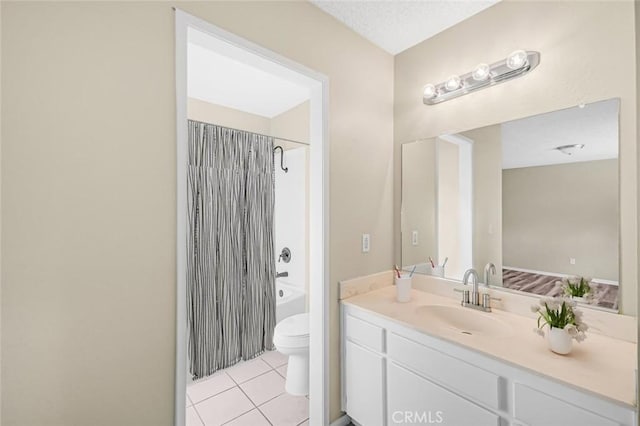 full bathroom featuring toilet, tile patterned flooring, bathtub / shower combination, and vanity