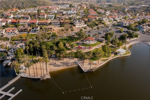aerial view with a water view and a residential view