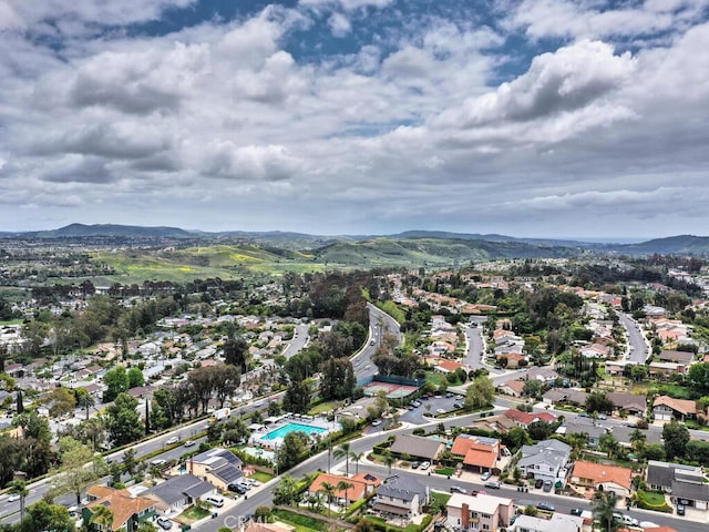 bird's eye view featuring a mountain view and a residential view