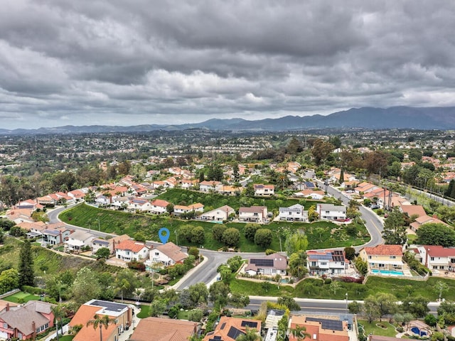 drone / aerial view with a mountain view and a residential view