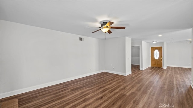 unfurnished living room featuring visible vents, baseboards, dark wood-style floors, recessed lighting, and a ceiling fan