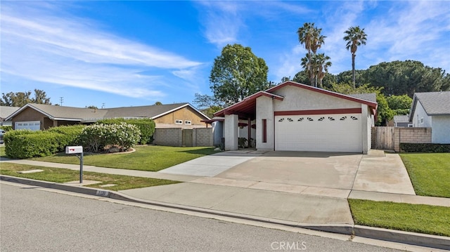 ranch-style house with an attached garage, a front lawn, fence, and driveway
