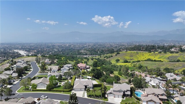 aerial view featuring a mountain view and a residential view