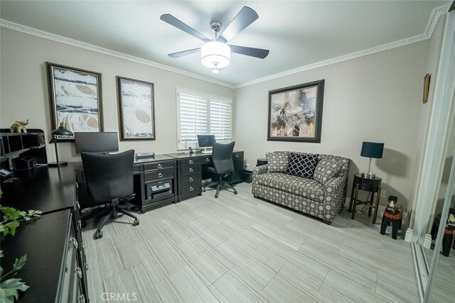 office space featuring ornamental molding and a ceiling fan