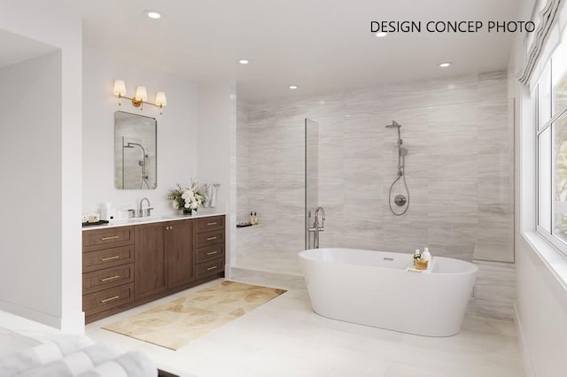 927 9th St, Manhattan Beach, CA 90266 - bathroom with a freestanding tub, tiled shower, vanity, and recessed lighting