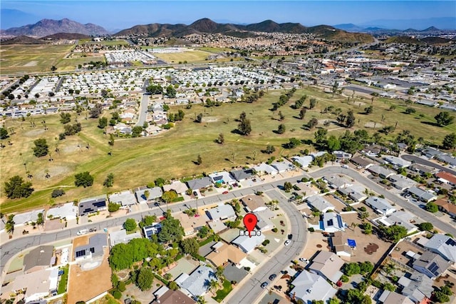 27680 Sandtrap Dr, Menifee, CA 92586 - aerial overview of property's location with a mountainous background and nearby suburban area