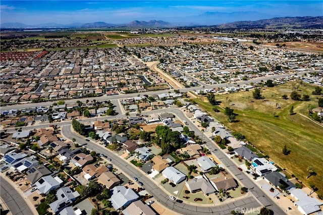 27680 Sandtrap Dr, Menifee, CA 92586 - aerial view of property and surrounding area featuring a mountain backdrop and nearby suburban area