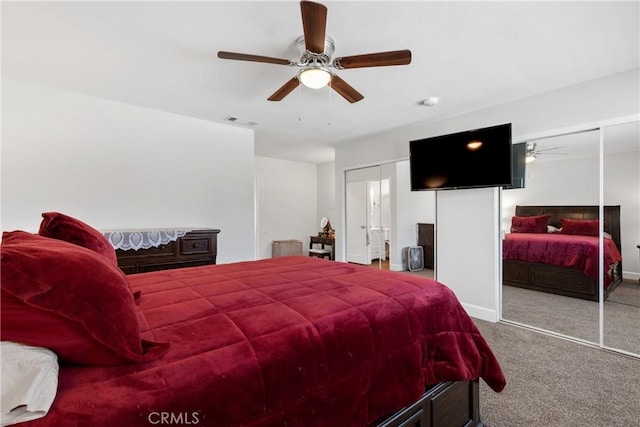bedroom featuring visible vents, a ceiling fan, and carpet floors
