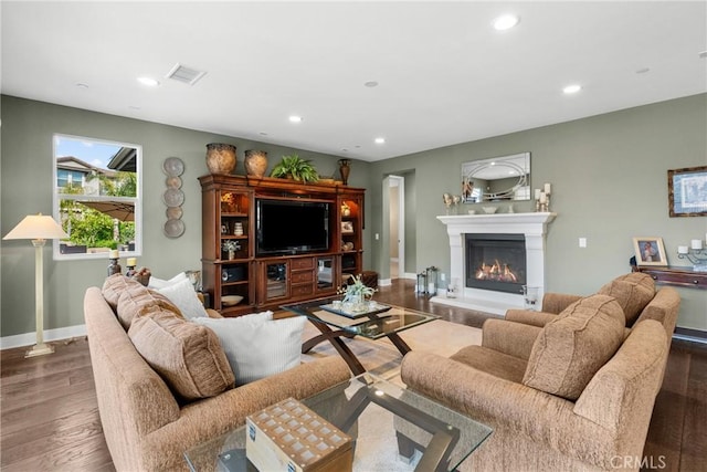 21609 Lucas Ct, Saugus, CA 91390 - living room featuring recessed lighting, baseboards, a glass covered fireplace, and wood finished floors