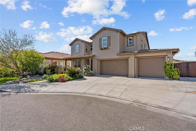 21609 Lucas Ct, Saugus, CA 91390 - traditional home with fence, board and batten siding, concrete driveway, an attached garage, and a tile roof