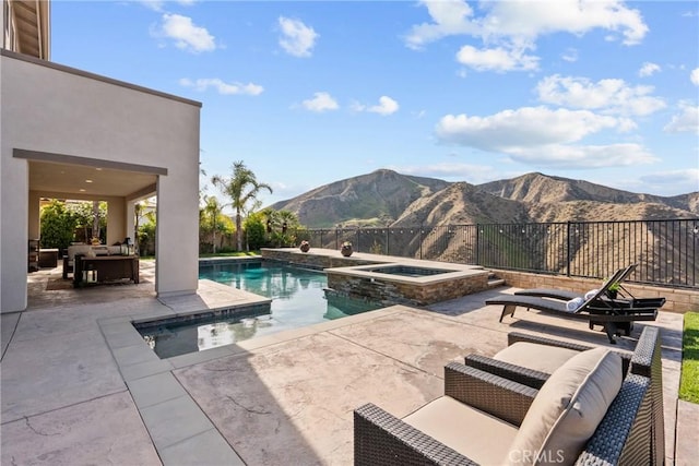 21609 Lucas Ct, Saugus, CA 91390 - view of swimming pool with a mountain view, a pool with connected hot tub, and a patio area