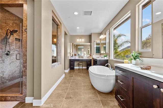 21609 Lucas Ct, Saugus, CA 91390 - full bath with tile patterned flooring, two vanities, visible vents, a soaking tub, and a stall shower