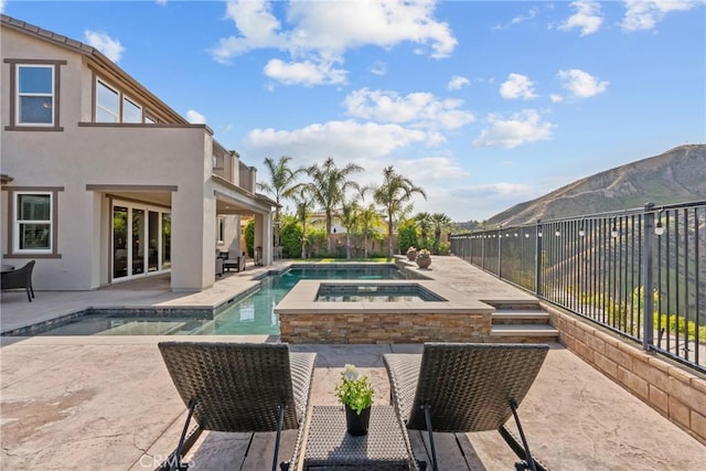 21609 Lucas Ct, Saugus, CA 91390 - view of swimming pool with a fenced in pool, a mountain view, an in ground hot tub, a patio, and fence private yard