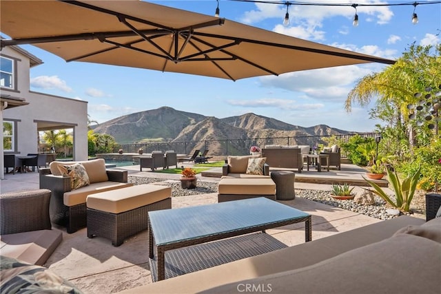 21609 Lucas Ct, Saugus, CA 91390 - view of patio / terrace featuring a mountain view, an outdoor living space, and outdoor dining space