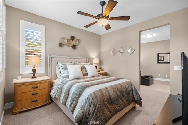 21609 Lucas Ct, Saugus, CA 91390 - bedroom with baseboards, ceiling fan, and light carpet