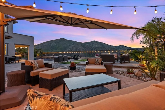 21609 Lucas Ct, Saugus, CA 91390 - view of patio / terrace with an outdoor living space with a fire pit, a mountain view, and outdoor dining area