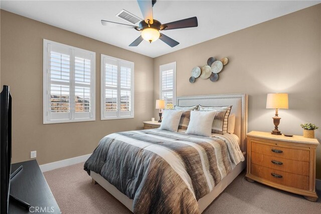 21609 Lucas Ct, Saugus, CA 91390 - bedroom featuring baseboards, visible vents, a ceiling fan, and light colored carpet
