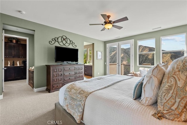 21609 Lucas Ct, Saugus, CA 91390 - bedroom with access to exterior, visible vents, baseboards, ensuite bathroom, and light carpet