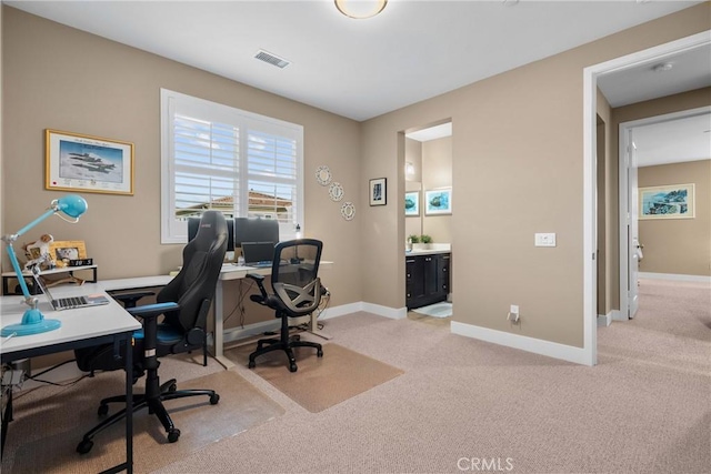 21609 Lucas Ct, Saugus, CA 91390 - office area with visible vents, baseboards, and light carpet