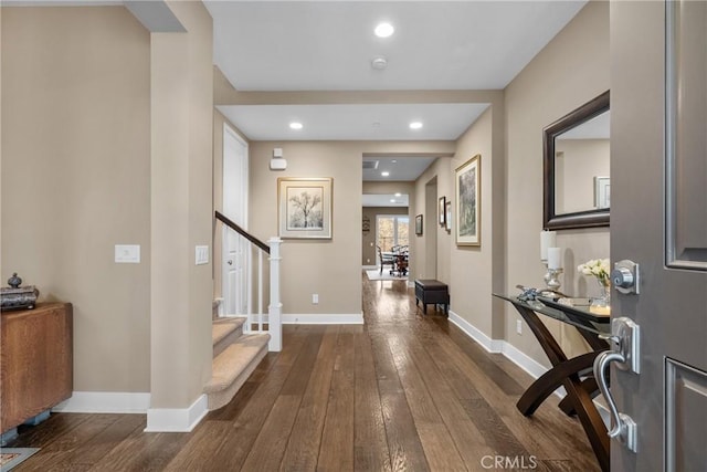 21609 Lucas Ct, Saugus, CA 91390 - entrance foyer with baseboards, dark wood-style flooring, and stairs