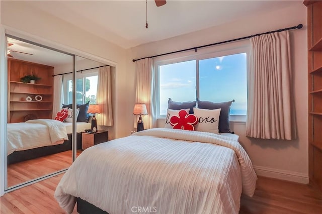 2978 Crownview Dr, Rancho Palos Verdes, CA 90275 - bedroom featuring wood finished floors, a closet, and ceiling fan