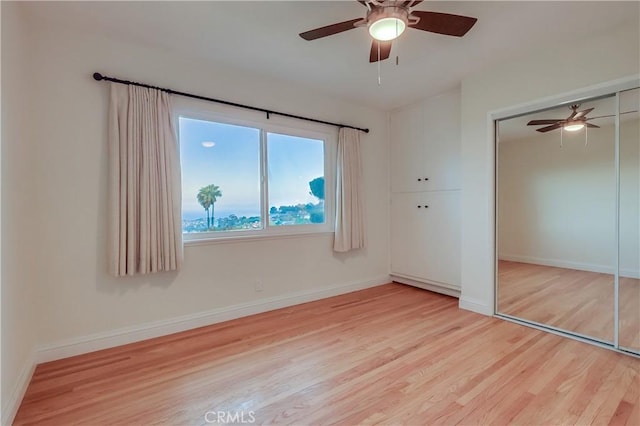 2978 Crownview Dr, Rancho Palos Verdes, CA 90275 - unfurnished bedroom featuring wood finished floors, a closet, and ceiling fan