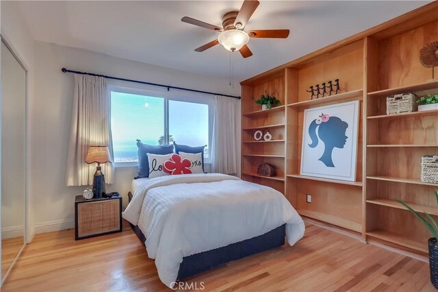 2978 Crownview Dr, Rancho Palos Verdes, CA 90275 - bedroom with light wood-style flooring and ceiling fan