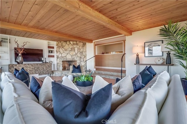 2978 Crownview Dr, Rancho Palos Verdes, CA 90275 - living area with a wooden ceiling with exposed beams, built in shelves, and a fireplace