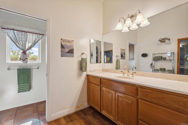 25444 Rancho Barona Rd, Ramona, CA 92065 - bathroom featuring vanity, a chandelier, baseboards, and tile patterned floors
