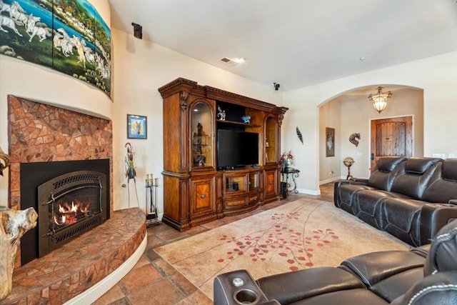 25444 Rancho Barona Rd, Ramona, CA 92065 - living area featuring arched walkways and a glass covered fireplace