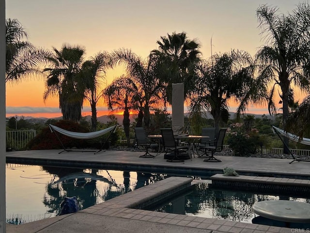 25444 Rancho Barona Rd, Ramona, CA 92065 - pool at dusk with a patio and an outdoor pool
