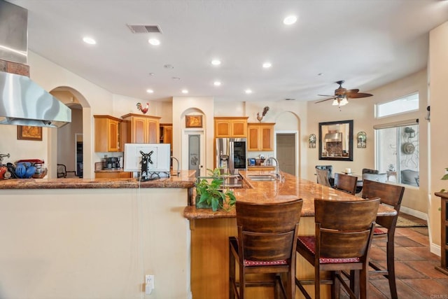 25444 Rancho Barona Rd, Ramona, CA 92065 - kitchen with arched walkways, a sink, stainless steel refrigerator with ice dispenser, a ceiling fan, and recessed lighting