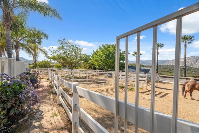 25444 Rancho Barona Rd, Ramona, CA 92065 - view of yard with a mountain view, an exterior structure, and a view of countryside