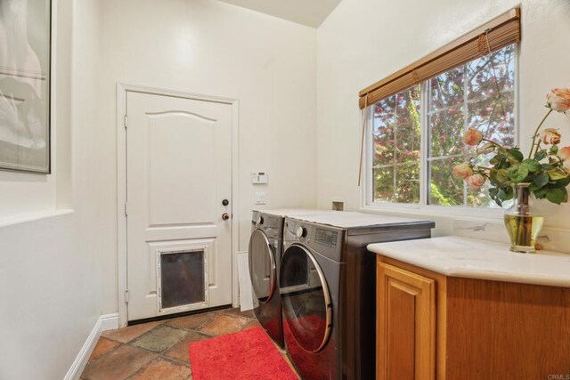 25444 Rancho Barona Rd, Ramona, CA 92065 - washroom with separate washer and dryer, baseboards, and dark stone finish floors