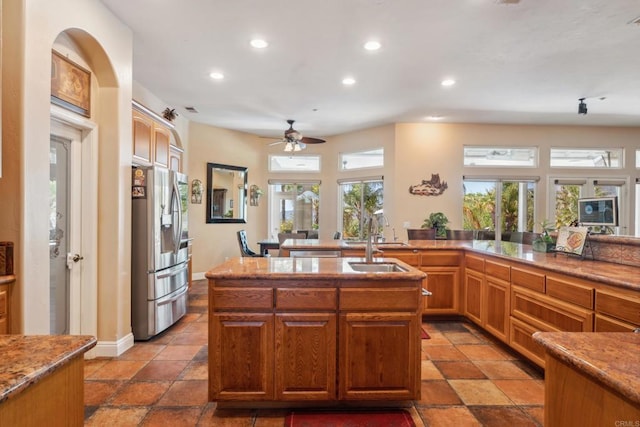 25444 Rancho Barona Rd, Ramona, CA 92065 - kitchen featuring stainless steel refrigerator with ice dispenser, recessed lighting, ceiling fan, light stone counters, and a sink
