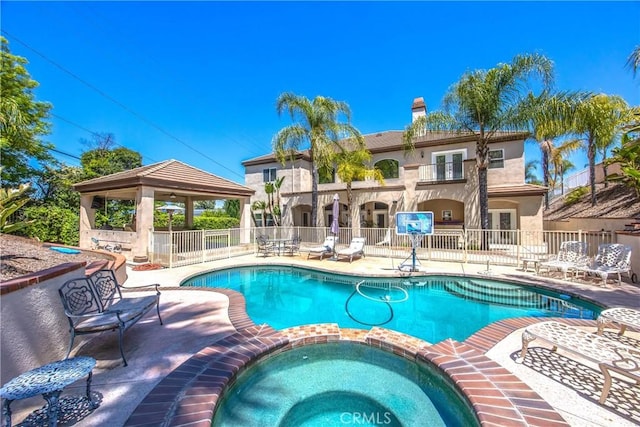652 Fairway Dr, Redlands, CA 92373 - view of swimming pool with a gazebo, fence, a pool with connected hot tub, and a patio