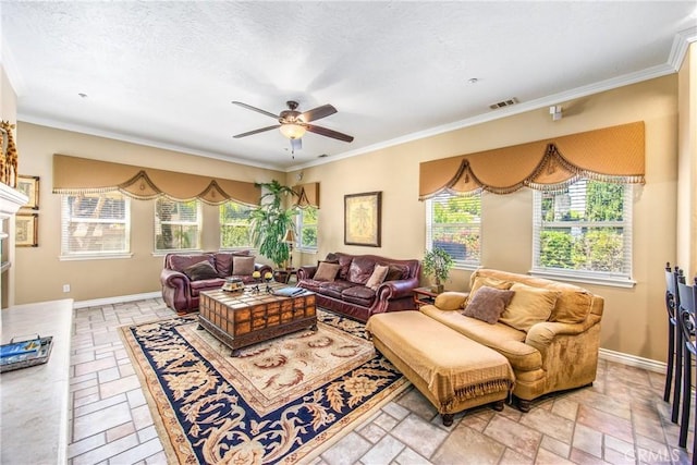 652 Fairway Dr, Redlands, CA 92373 - living room with plenty of natural light, stone tile floors, ceiling fan, and crown molding