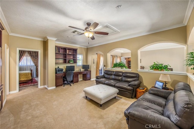 652 Fairway Dr, Redlands, CA 92373 - living room with an office area, plenty of natural light, light colored carpet, ceiling fan, and ornamental molding