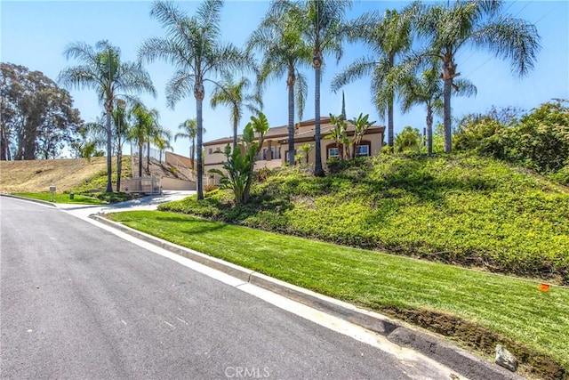 652 Fairway Dr, Redlands, CA 92373 - view of asphalt street featuring curbs