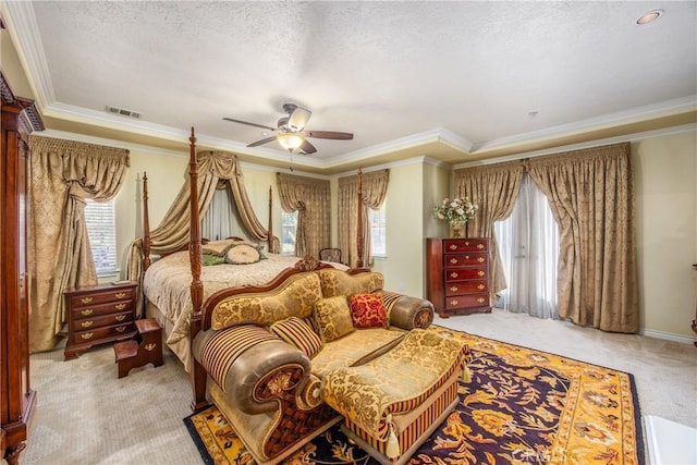 652 Fairway Dr, Redlands, CA 92373 - bedroom with light carpet, crown molding, a textured ceiling, a ceiling fan, and a raised ceiling