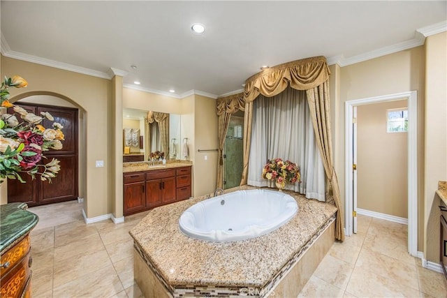 652 Fairway Dr, Redlands, CA 92373 - bathroom featuring vanity, ornamental molding, recessed lighting, baseboards, and a garden tub