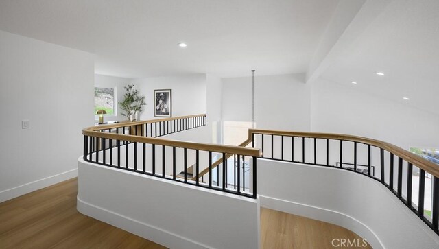 24411 Kings Vw, Laguna Niguel, CA 92677 - stairway featuring wood finished floors, high vaulted ceiling, and recessed lighting