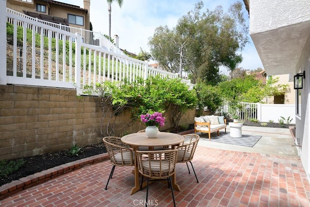 24411 Kings Vw, Laguna Niguel, CA 92677 - fenced backyard featuring a patio area, outdoor lounge area, and outdoor dining area